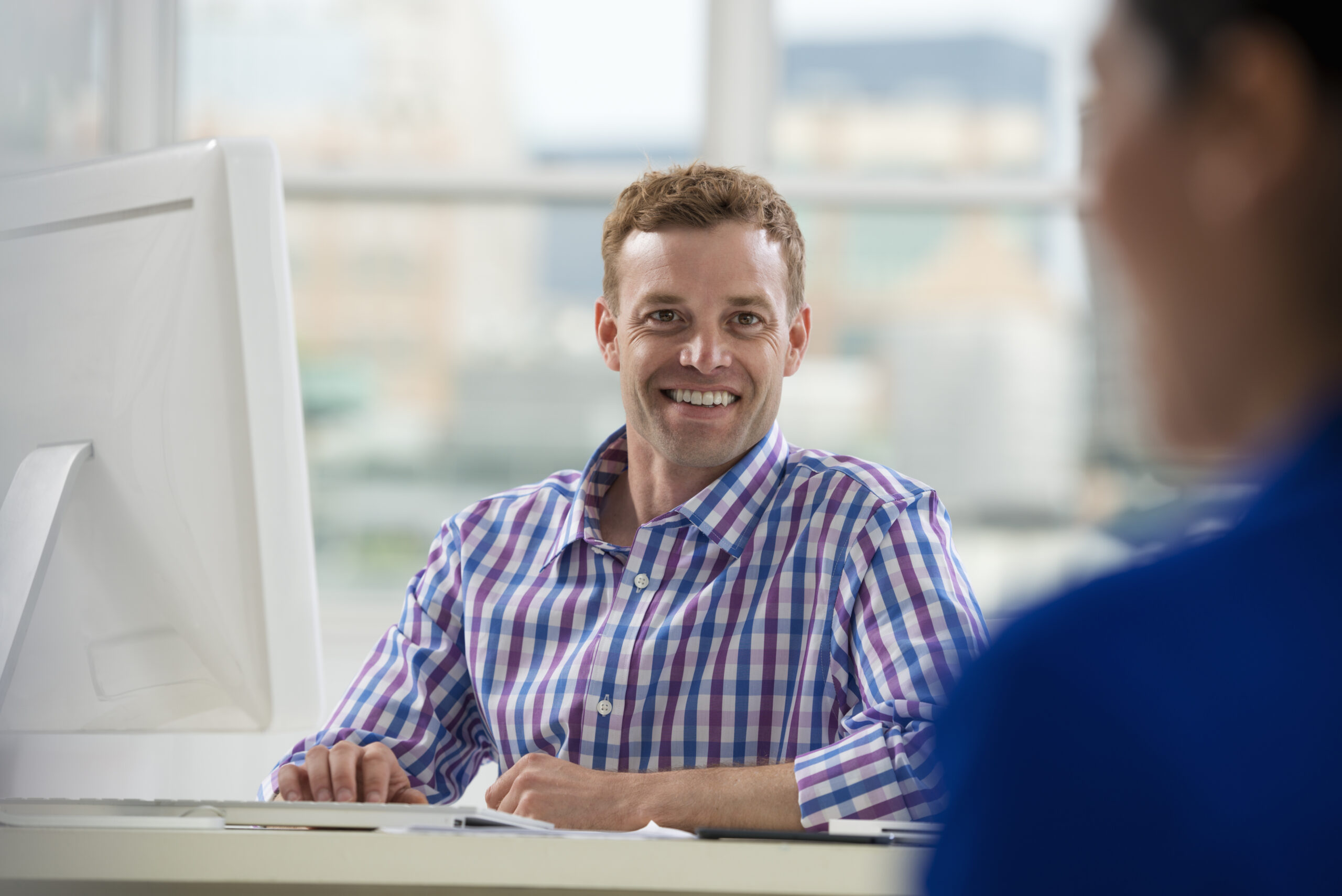Local accountant for Hampshire businesses - Man sitting infront of computer